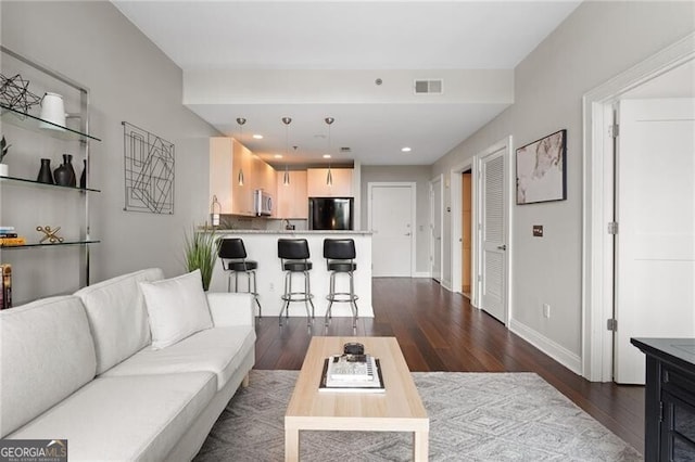 905 Juniper St NE Unit 701, Atlanta, GA 30309 - living room with dark wood finished floors and recessed lighting