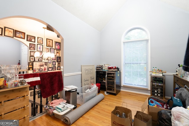 1858 Mcconnell Rd, Grayson, GA 30017 - office featuring wine cooler, arched walkways, lofted ceiling, and wood finished floors