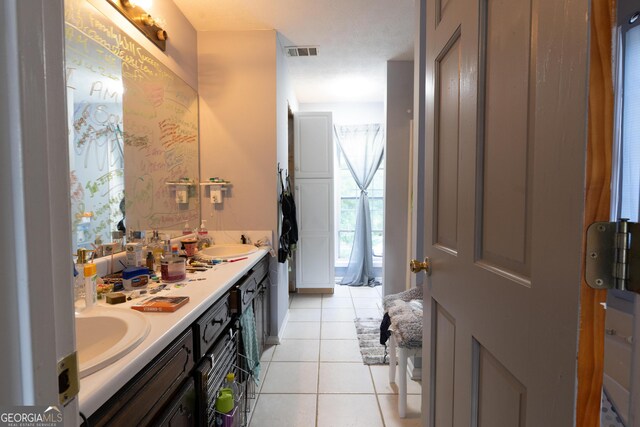 1858 Mcconnell Rd, Grayson, GA 30017 - full bath with double vanity and tile patterned floors