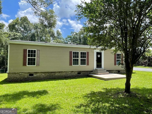 601 Auburn Rd, Glennville, GA 30427 - view of front of house with crawl space, a front yard, and entry steps