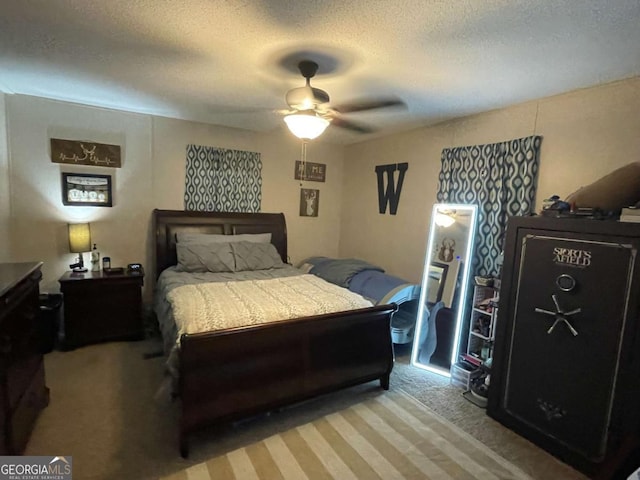 601 Auburn Rd, Glennville, GA 30427 - carpeted bedroom with a textured ceiling and ceiling fan