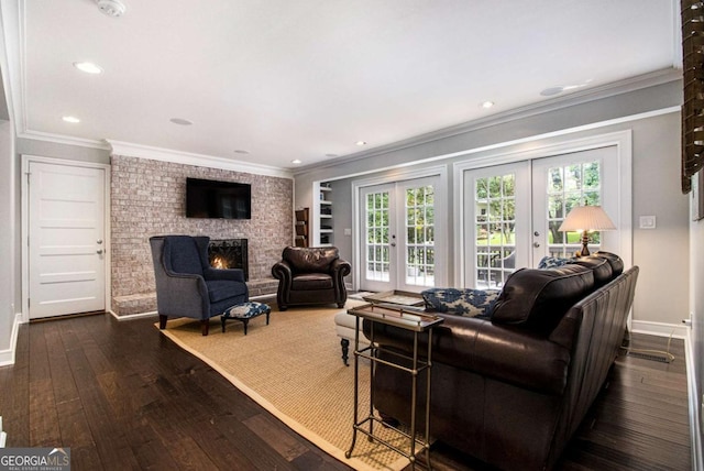 1379 Cambridge Ct NE, Brookhaven, GA 30319 - living area with healthy amount of natural light, french doors, a fireplace, dark wood-type flooring, and ornamental molding