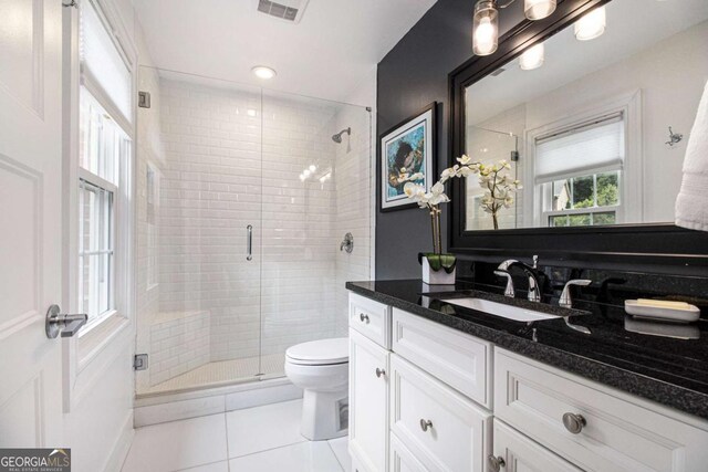 1379 Cambridge Ct NE, Brookhaven, GA 30319 - bathroom with tile patterned flooring, vanity, and a shower stall