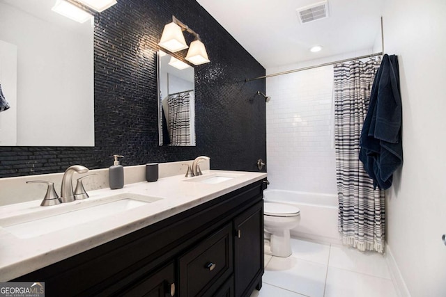 1379 Cambridge Ct NE, Brookhaven, GA 30319 - bathroom featuring tile patterned floors, shower / bath combo with shower curtain, and double vanity