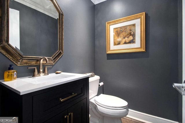 1379 Cambridge Ct NE, Brookhaven, GA 30319 - half bathroom featuring vanity and wood finished floors