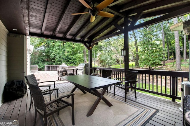 1379 Cambridge Ct NE, Brookhaven, GA 30319 - wooden terrace with outdoor dining space, ceiling fan, area for grilling, and view of wooded area