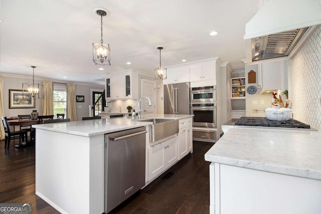 1379 Cambridge Ct NE, Brookhaven, GA 30319 - kitchen with appliances with stainless steel finishes, a chandelier, white cabinetry, ornamental molding, and recessed lighting
