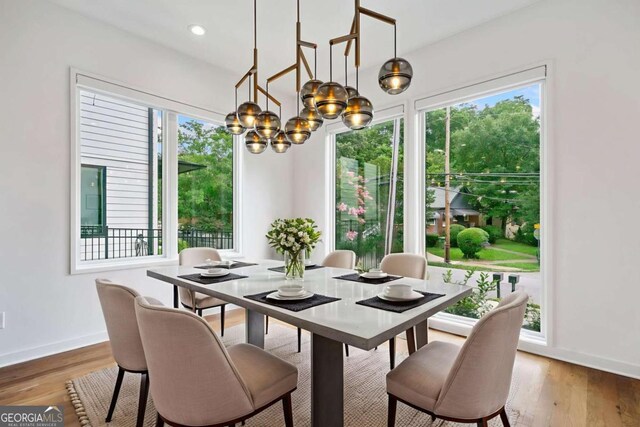32 Walthall St NE Unit A, Atlanta, GA 30307 - dining room featuring a chandelier, plenty of natural light, wood finished floors, and recessed lighting