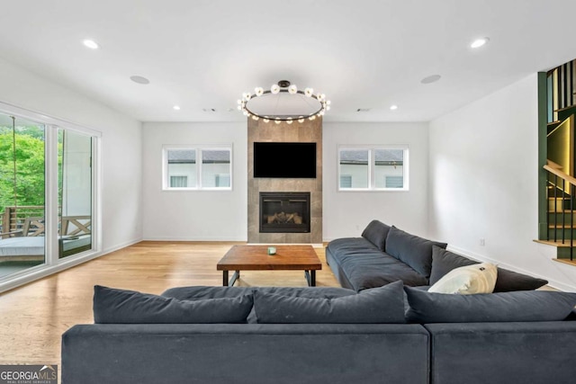 32 Walthall St NE Unit A, Atlanta, GA 30307 - living area featuring wood finished floors, recessed lighting, and a tiled fireplace