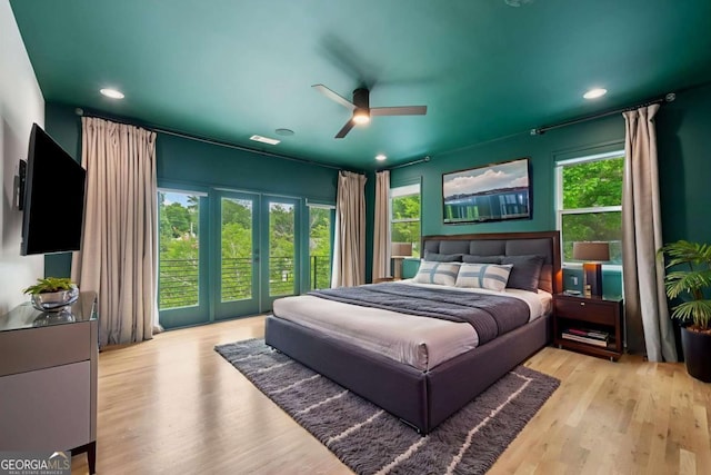 32 Walthall St NE Unit A, Atlanta, GA 30307 - bedroom with multiple windows, wood finished floors, recessed lighting, and french doors