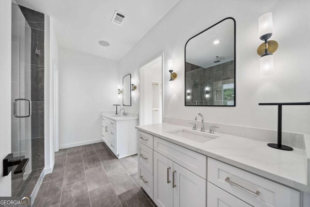 32 Walthall St NE Unit A, Atlanta, GA 30307 - bathroom featuring a shower stall and two vanities