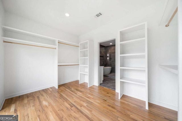 32 Walthall St NE Unit A, Atlanta, GA 30307 - spacious closet with wood finished floors