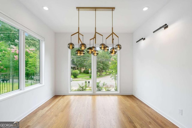 32 Walthall St NE Unit A, Atlanta, GA 30307 - spare room featuring a chandelier, wood finished floors, and recessed lighting