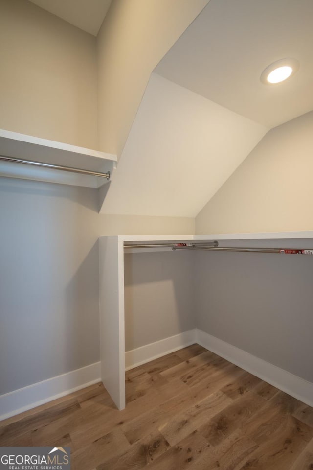 145 Holmes Ave, Athens, GA 30606 - spacious closet with wood finished floors and vaulted ceiling