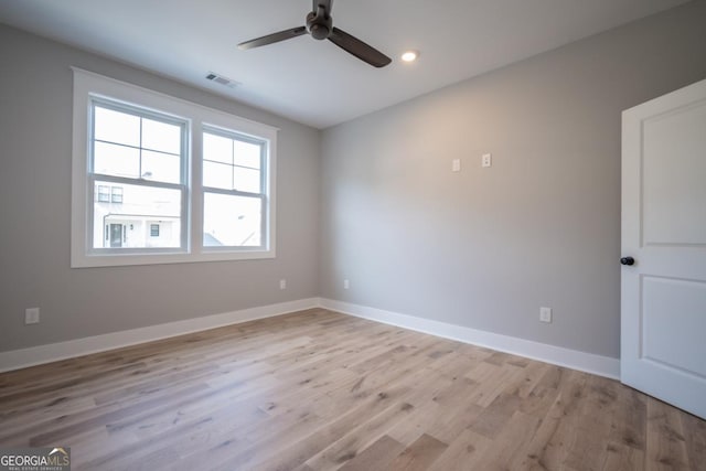 145 Holmes Ave, Athens, GA 30606 - empty room with a ceiling fan, light wood-style flooring, and recessed lighting