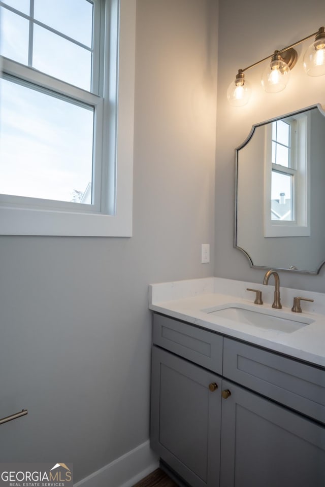 145 Holmes Ave, Athens, GA 30606 - bathroom with vanity and baseboards
