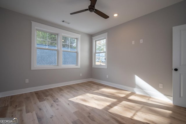 145 Holmes Ave, Athens, GA 30606 - unfurnished room with a ceiling fan, wood finished floors, and recessed lighting