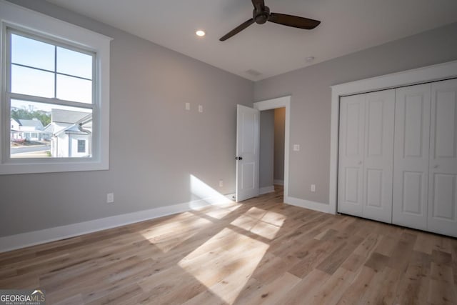 145 Holmes Ave, Athens, GA 30606 - unfurnished bedroom with light wood-style flooring, a closet, ceiling fan, and recessed lighting