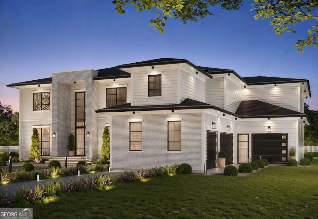 3769 High Green Dr, Marietta, GA 30068 - contemporary home featuring a front lawn, brick siding, and a garage