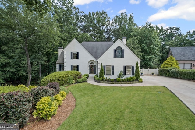 3648 Sope Creek Farm SE, Marietta, GA 30067 - view of front of house with a chimney, concrete driveway, and stucco siding