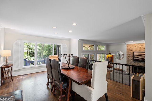 3648 Sope Creek Farm SE, Marietta, GA 30067 - dining room with dark wood-style flooring, crown molding, recessed lighting, and a fireplace