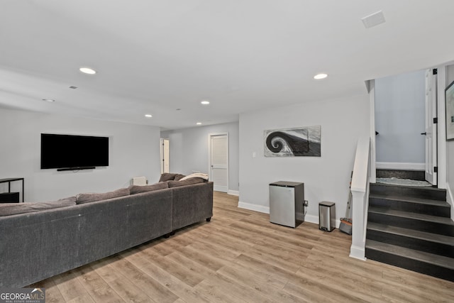 3648 Sope Creek Farm SE, Marietta, GA 30067 - living room featuring light wood-style floors, recessed lighting, and stairs
