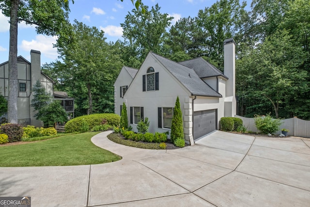 3648 Sope Creek Farm SE, Marietta, GA 30067 - view of front of property featuring stucco siding, concrete driveway, an attached garage, a chimney, and a shingled roof