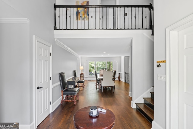 3648 Sope Creek Farm SE, Marietta, GA 30067 - living area with wood finished floors, crown molding, and stairs