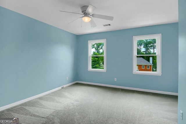 1197 Kenilworth Trce, Snellville, GA 30078 - carpeted empty room with baseboards and a ceiling fan