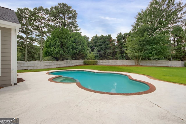 1197 Kenilworth Trce, Snellville, GA 30078 - view of pool featuring a fenced backyard, a patio area, a pool with connected hot tub, and view of scattered trees