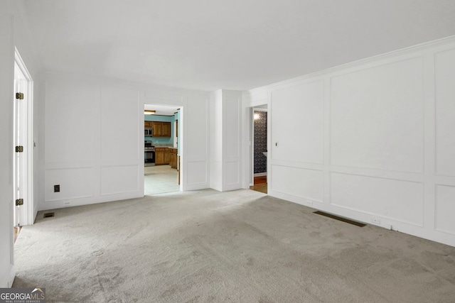 1197 Kenilworth Trce, Snellville, GA 30078 - empty room with a decorative wall and carpet flooring