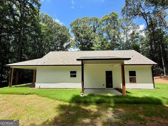 TRACT3 Grogan Rd, Buchanan, GA 30113 - back of property featuring a yard, a shingled roof, and a patio