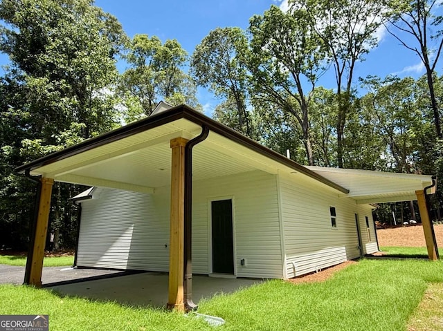 TRACT3 Grogan Rd, Buchanan, GA 30113 - back of property with a lawn and a carport