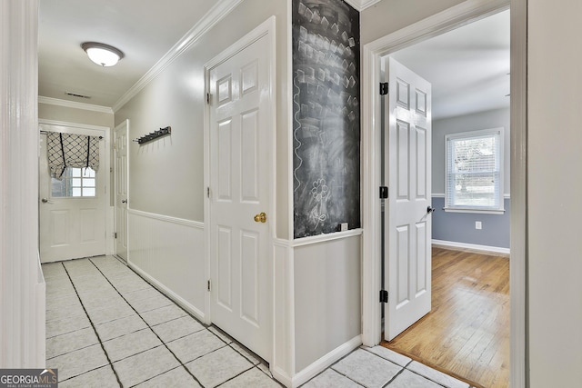 77 Springfield Ct, Newnan, GA 30265 - foyer entrance featuring light tile patterned floors and ornamental molding