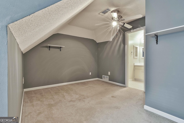 77 Springfield Ct, Newnan, GA 30265 - bonus room with carpet flooring, ceiling fan, and lofted ceiling