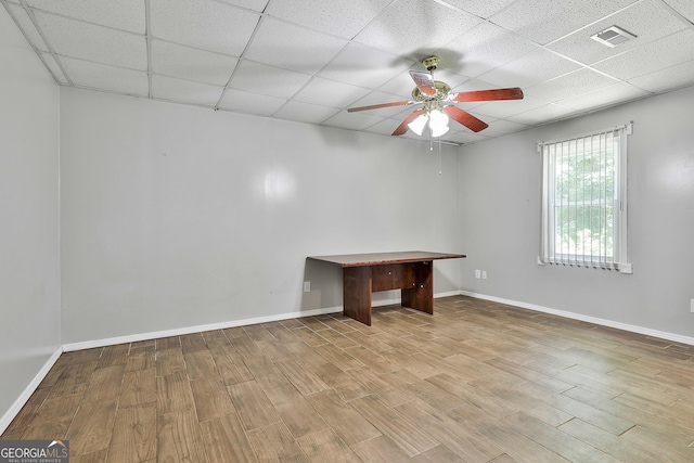 77 Springfield Ct, Newnan, GA 30265 - unfurnished room featuring a paneled ceiling, ceiling fan, and wood finished floors