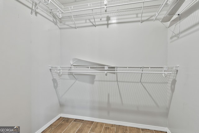 77 Springfield Ct, Newnan, GA 30265 - walk in closet featuring wood finished floors