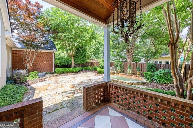 133 N Wellington, Macon, GA 31210 - fenced backyard featuring a patio area