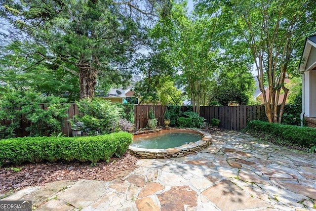 133 N Wellington, Macon, GA 31210 - view of pool featuring a jacuzzi, a fenced backyard, and a patio area
