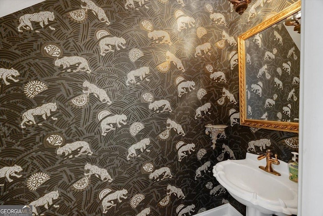 133 N Wellington, Macon, GA 31210 - bathroom featuring wallpapered walls and a sink