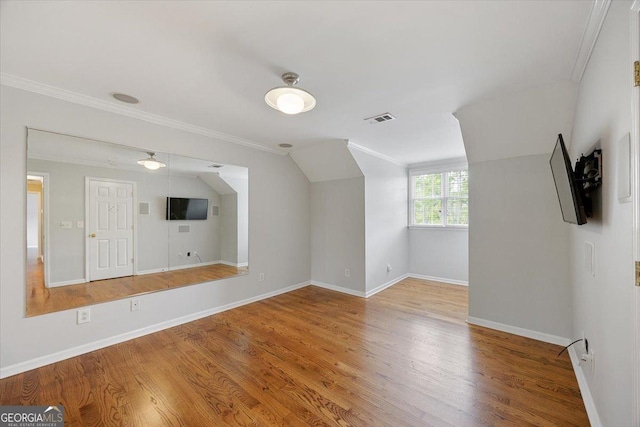 133 N Wellington, Macon, GA 31210 - additional living space featuring wood finished floors and vaulted ceiling