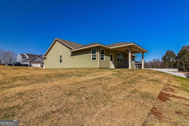 110 Golden Ingot Ct, Perry, GA 31069 - view of front of house with a front lawn and a ceiling fan