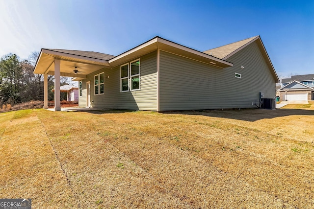 110 Golden Ingot Ct, Perry, GA 31069 - view of home's exterior featuring ceiling fan and a lawn