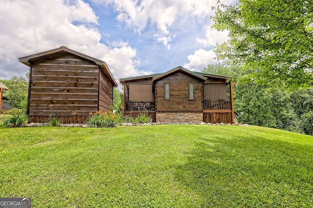 41 Wilderness Ct, Blairsville, GA 30512 - rear view of house featuring a lawn