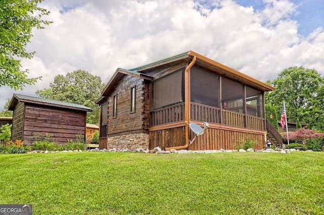 41 Wilderness Ct, Blairsville, GA 30512 - view of front of home featuring a sunroom and a front lawn