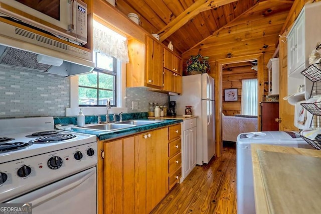 41 Wilderness Ct, Blairsville, GA 30512 - kitchen featuring white appliances, washer / dryer, wood finished floors, wood ceiling, and decorative backsplash