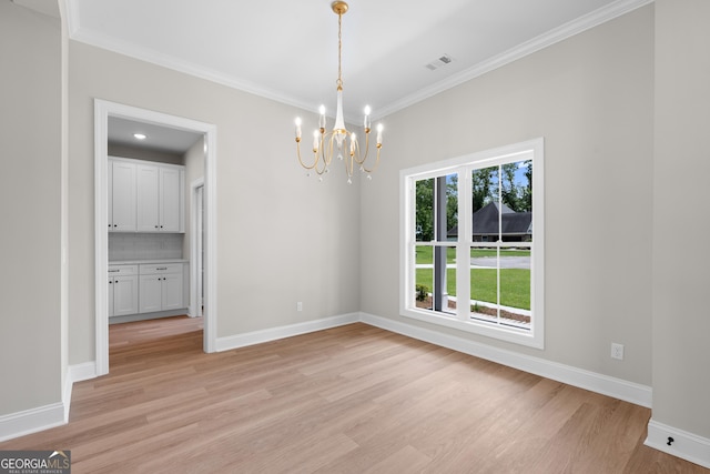 19 Honeysuckle Dr, Claxton, GA 30417 - unfurnished room featuring a chandelier, light wood-type flooring, and ornamental molding