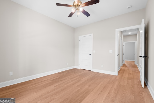 19 Honeysuckle Dr, Claxton, GA 30417 - unfurnished bedroom featuring light wood-style flooring and ceiling fan