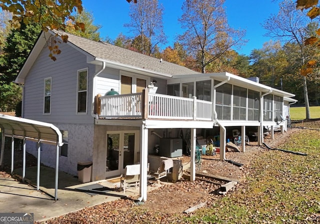 104 Bowers Cir, Blairsville, GA 30512 - rear view of house with a sunroom and roof with shingles