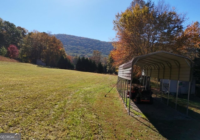 104 Bowers Cir, Blairsville, GA 30512 - view of grassy yard featuring a carport and a mountain view